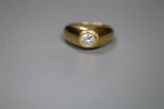 A modern 18ct gold and gypsy set solitaire diamond ring, size P, gross 10 grams,